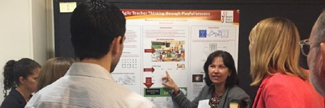Rhonda Bondie presenting a research poster at a conference